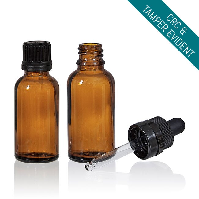 Amber glass boston round bottle with dropper or reducer cap for oils and serums Model BLCRAM