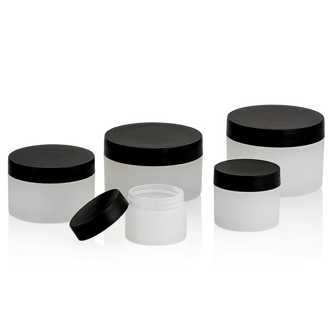 white cosmetic jars with black lids grouped together Model BLHBPPB